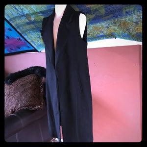 Long Zara vest with faux fur collar.